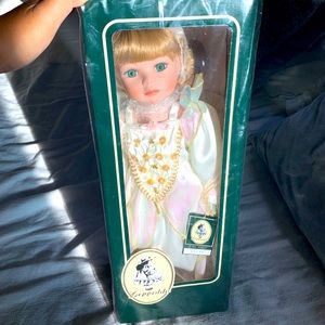 Ellie angel porcelain doll, never been opened, NWT, in original packaging